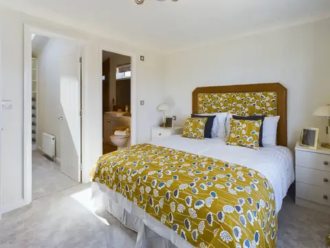Master bedroom with ensuite & walk‑in wardrobe