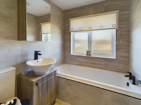 Bathroom with built‑in bath