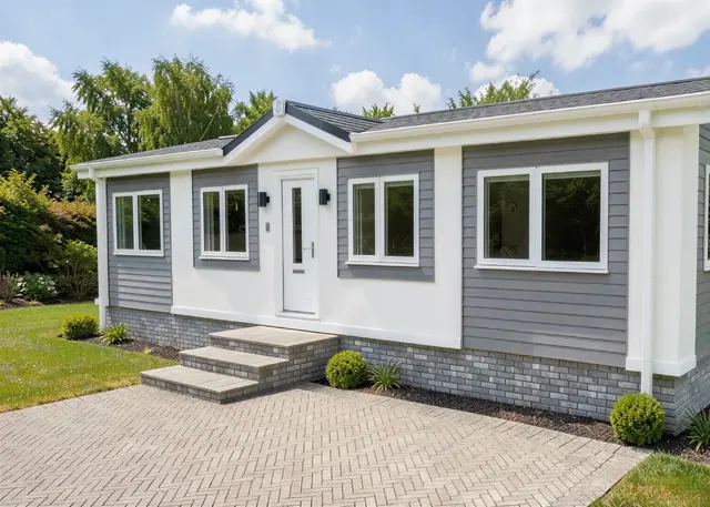 Highgrove park home sited on a residential park with a landscaped garden setting