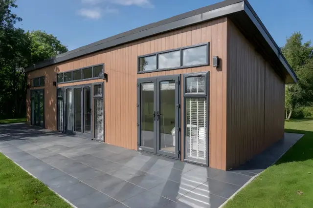 Exterior from view of the River Dart mono pitch lodge